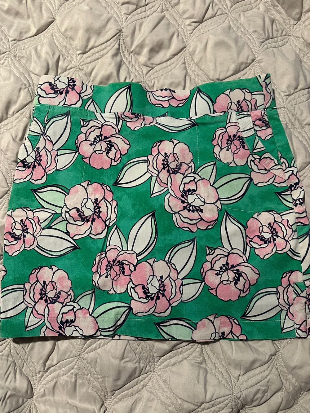 Crown & Ivy Pink Floral Mini Skirt on Green